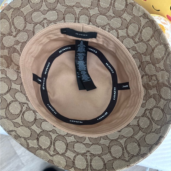 Coach Accessories - Coach Tan Monogram Hat